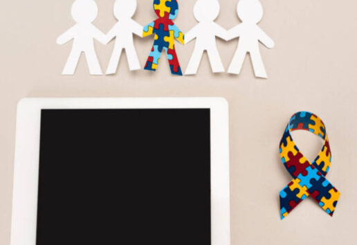 Silhouettes humaines avec puzzle central, ruban arc-en-ciel et tablette, symbolisant l'inclusion et l'autisme.